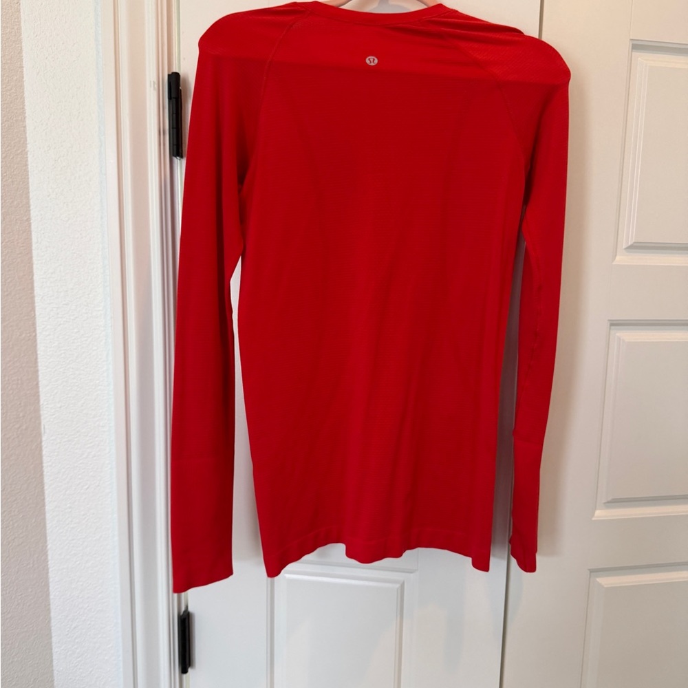 Lululemon Swiftly Tech Hip Length shirt, Size 6 in Hot Heat. EUC